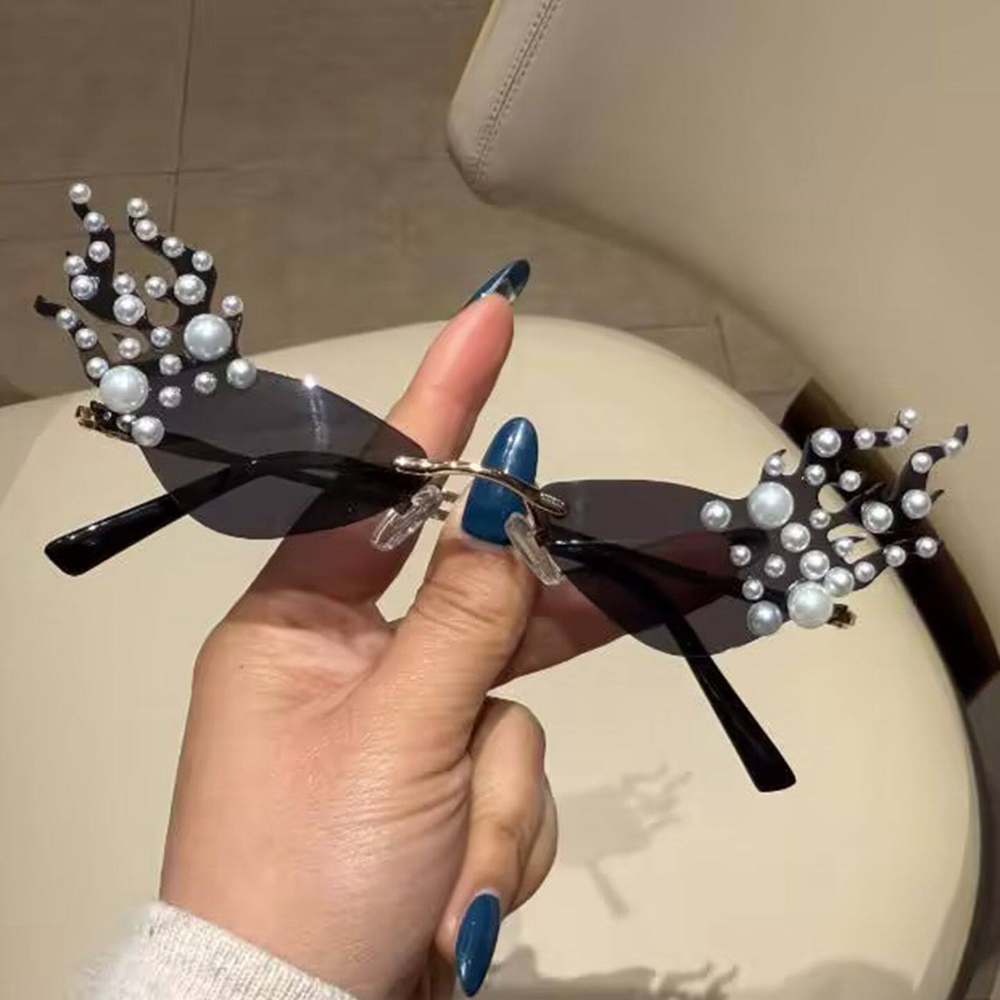 个性潮流翅膀镶钻太阳镜仙女风时尚百搭高级感珍珠眼镜框粉色墨镜