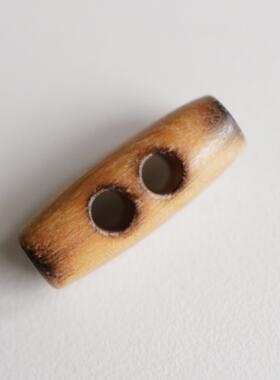 31mm×11mm1颗价英国Textile Garden双头中心随机烧焦橄榄木纽扣