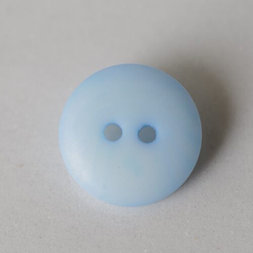 简洁两孔婴儿粉蓝象牙棕榈纽扣