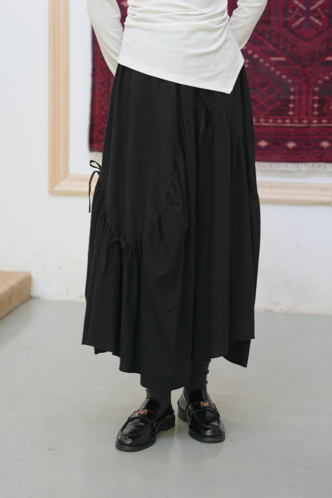 时尚收腰设计感不规则裙摆伯克利半裙黑色中长款伞裙秋冬半身裙女