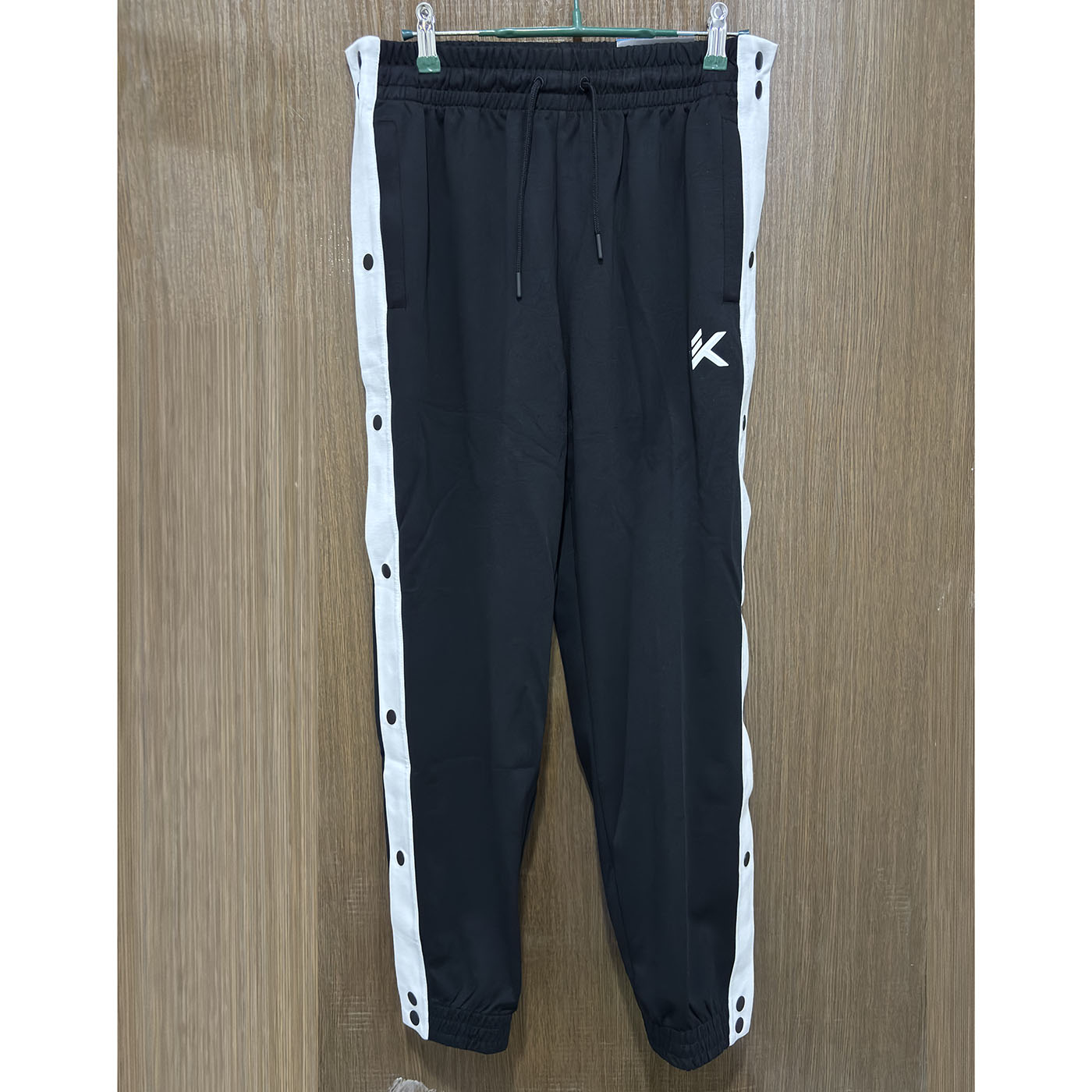 安踏正品春夏休闲拼色针织扯拉裤152421302