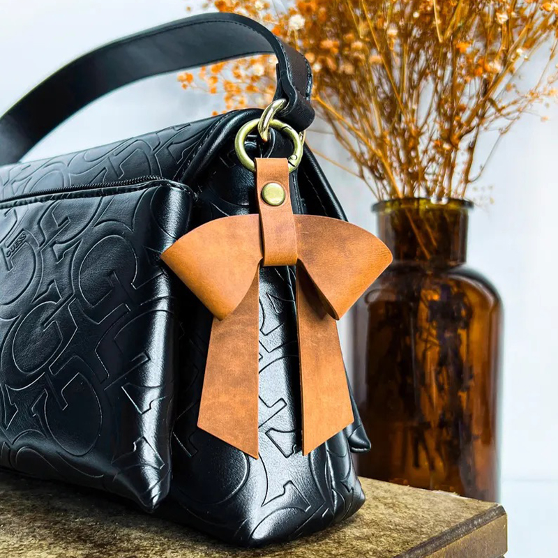 真皮质包包挂件小高级感毛毛棕色挂饰品秋冬装饰可爱蝴蝶结女手工