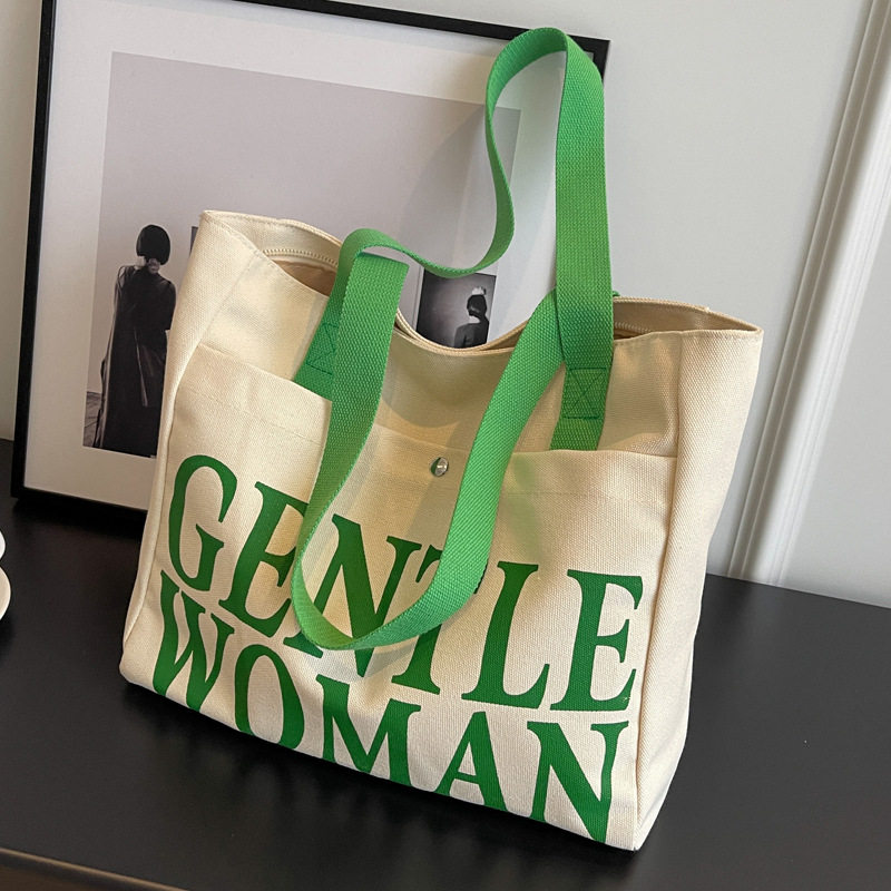 今年流行包包女 大容量2025新春夏百搭单肩购物袋帆布通勤托特包