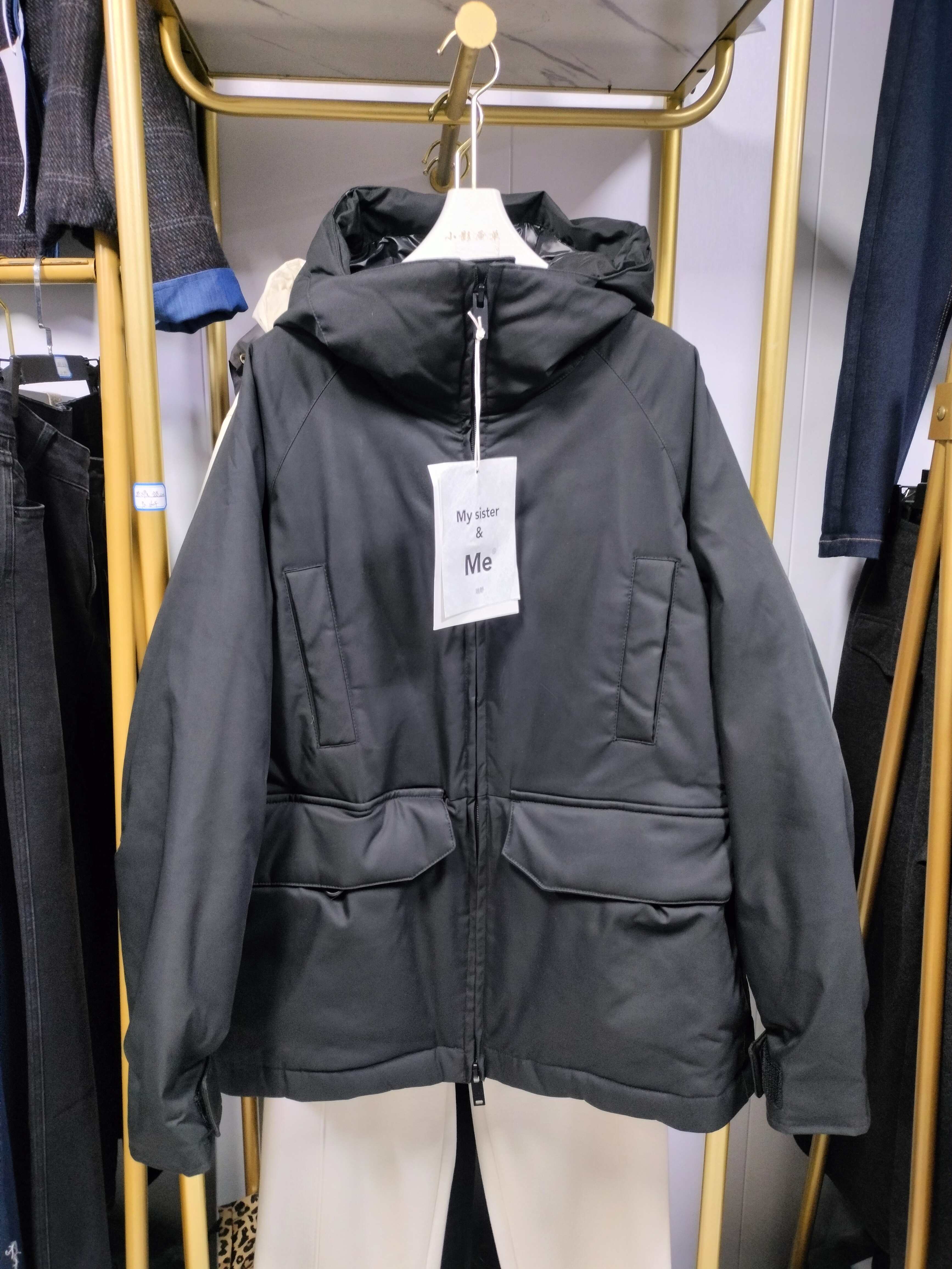 2025年欧洲站冬季新款瑞野时尚百搭简约连帽宽松版羽绒服外套