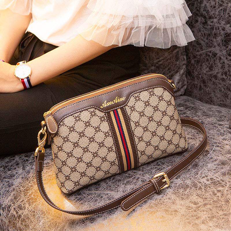 lv:vs女包香港代购品牌包包2021新款潮百搭小包时尚斜挎包贝壳包