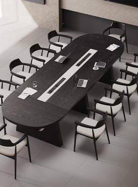 黑色椭圆形实木10人大型会议桌轻奢高级感2025新款大板办公桌长桌