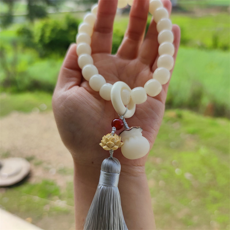 菩提根23颗跑环流苏手持手串女礼