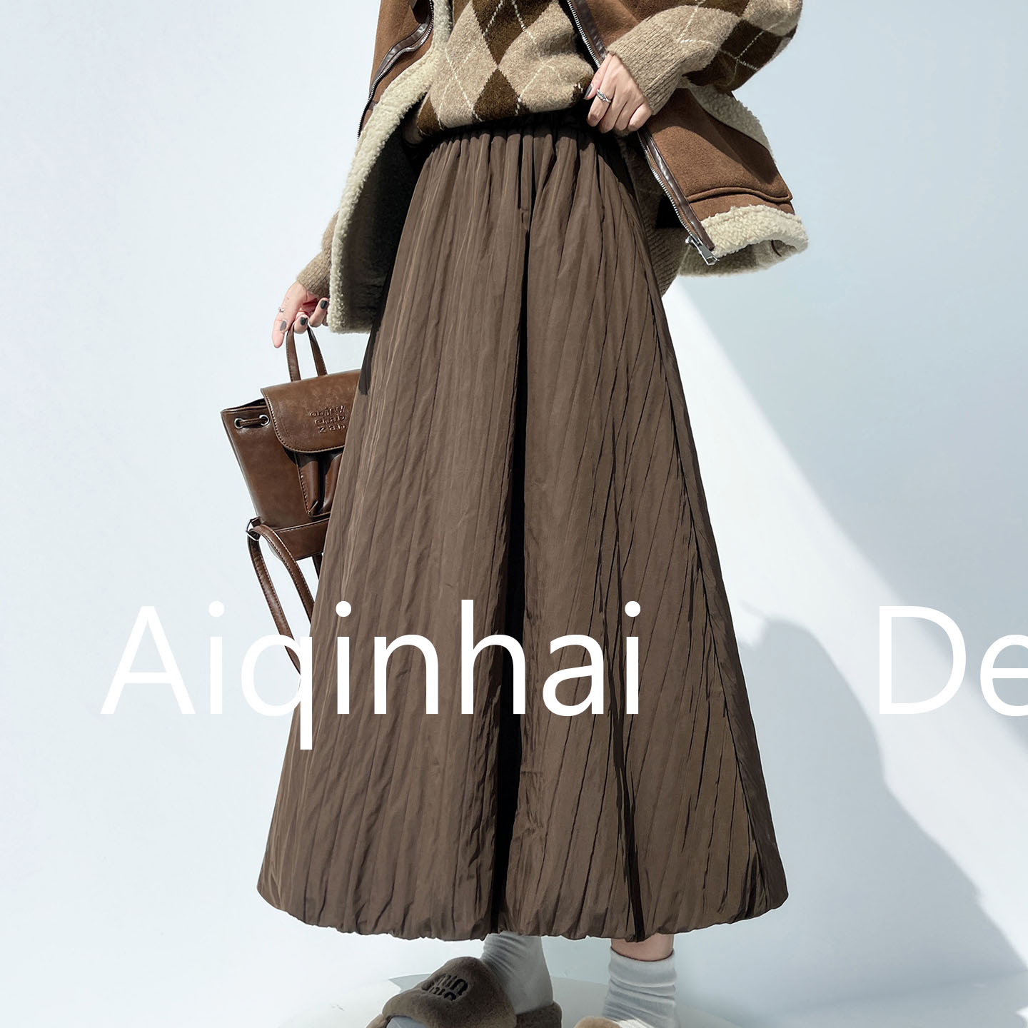 肌理感夹棉花苞半身裙