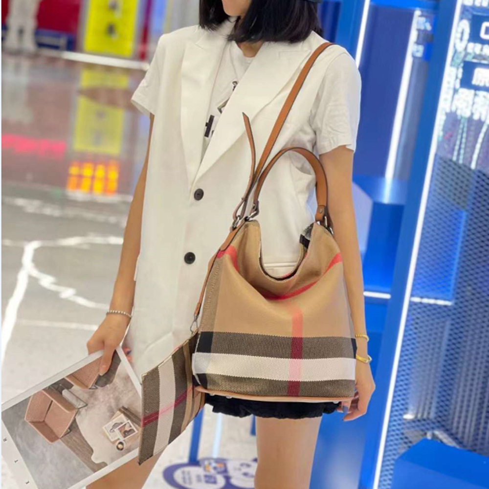 普洛克正品众撞色帆布水桶包女春季大容量包新款女包单肩包斜挎包