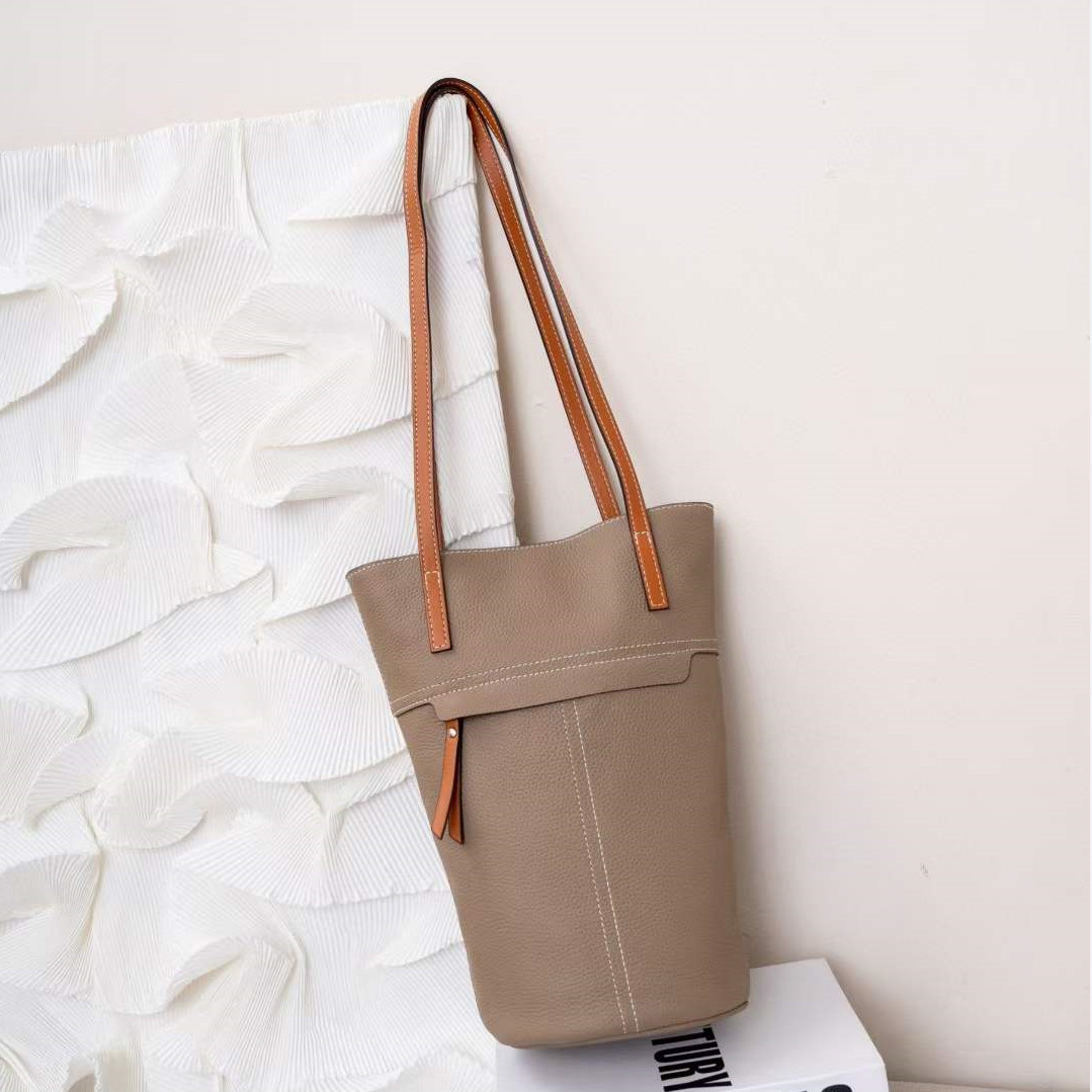 普洛克正品水桶包真皮女包大容量通勤托特包植鞣头层牛皮手提包女