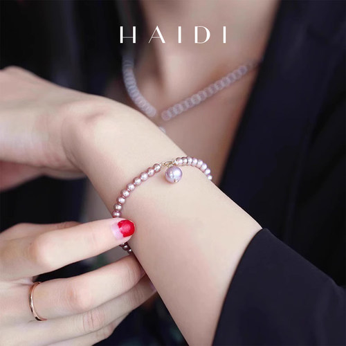 海蒂强光近圆紫色珍珠手链18K金