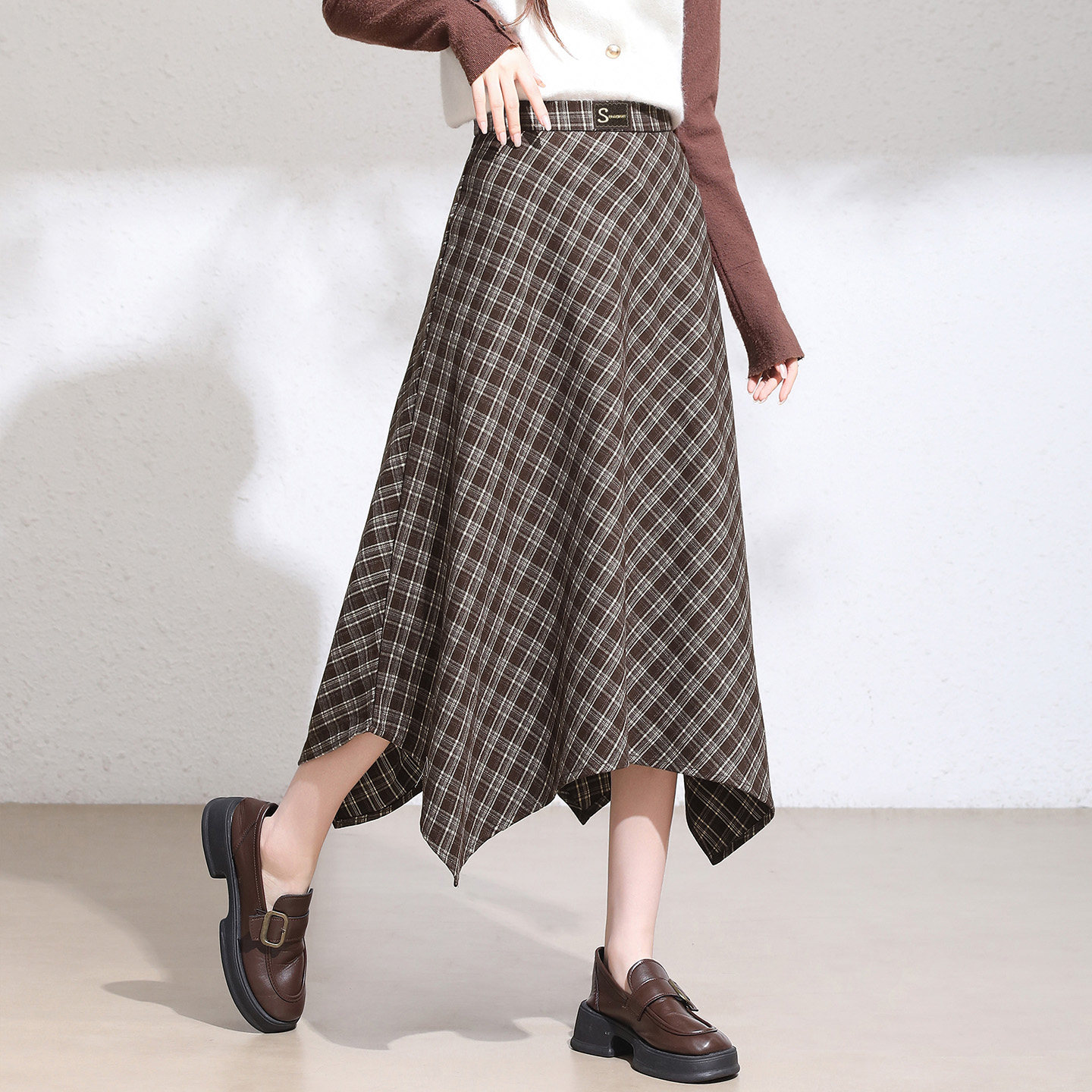 秋冬格子半身裙女2025新款冬装a字裙子美拉德咖色毛呢不规则长裙