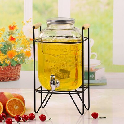 The glass jug bucket with tap water dispenser glass juice
