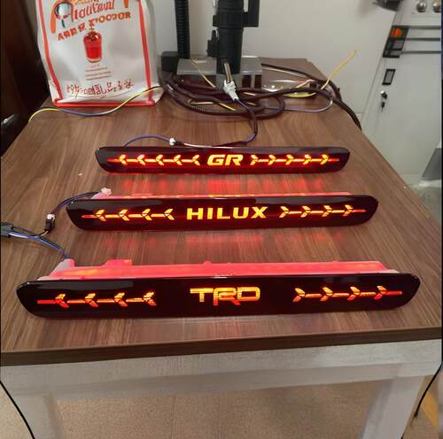 适用16-25款HILUX REVO皮卡改装尾门高位刹车灯后雾灯标装饰GR标