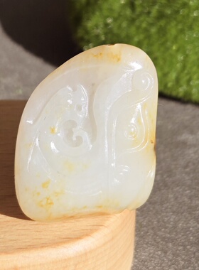 新疆的猫W121206 16.08克，聚红皮如枫林苏工白玉独籽凤牌