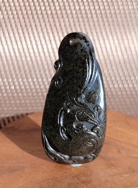 新疆的猫C122302 24.8克，老气老结油库皮仿古凤雕件