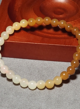 新疆的猫L102902 9.1克直径6mm色调油亮冰润且末糖白玉渐变手链