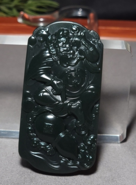 L020401 新疆的猫52.5克肉质细腻色调纯正的黑青玉细料钟馗雕件