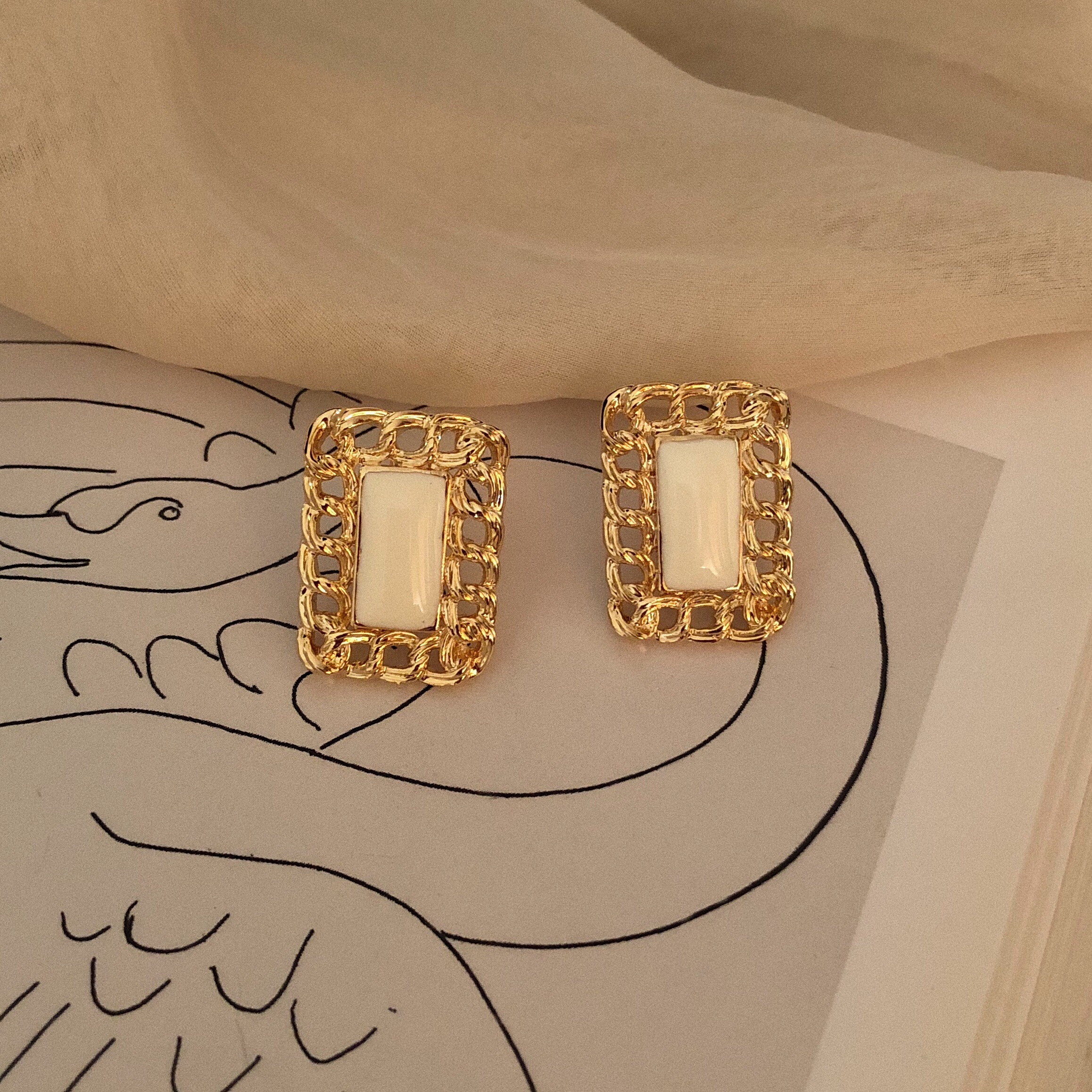 浮漾Float镂空编织方块纯银耳环