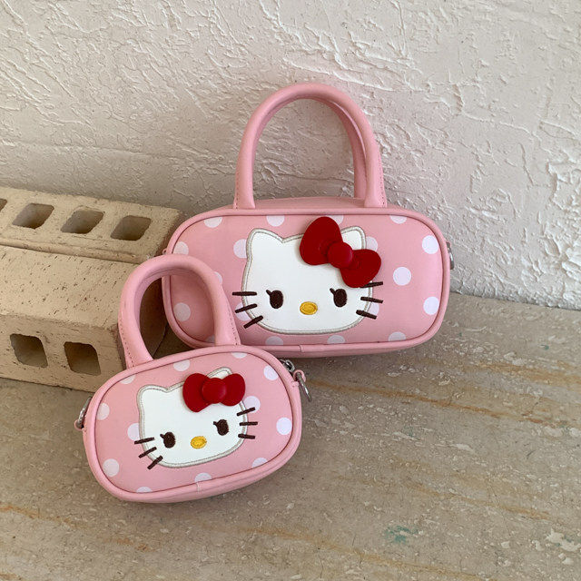 女童可爱卡通猫咪手提零钱包小公主蝴蝶结波点斜跨保龄球配饰包潮