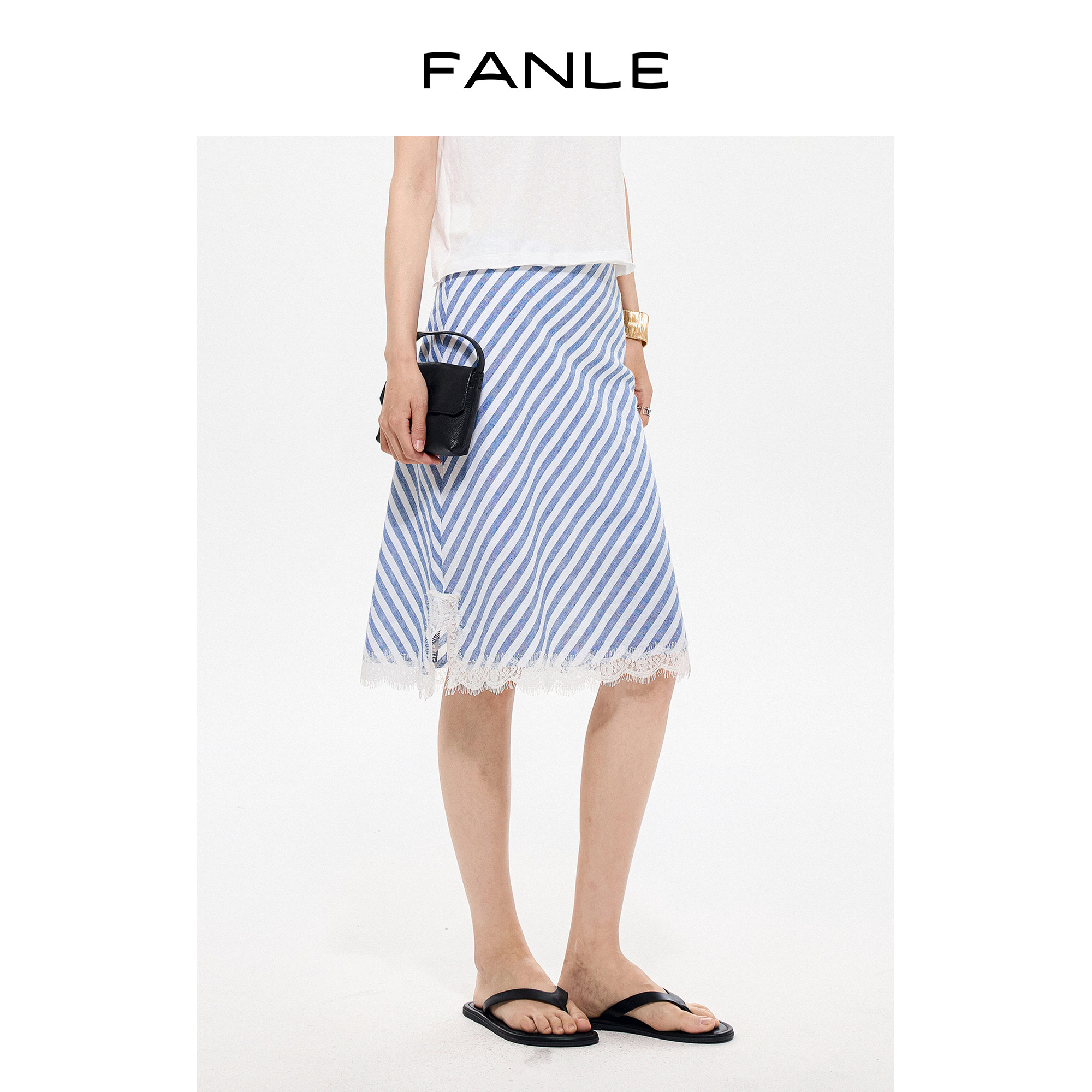 FANLE STUDIOS夏日轻盈度假风棉麻斜裁条纹蕾丝拼接鱼尾中裙图片