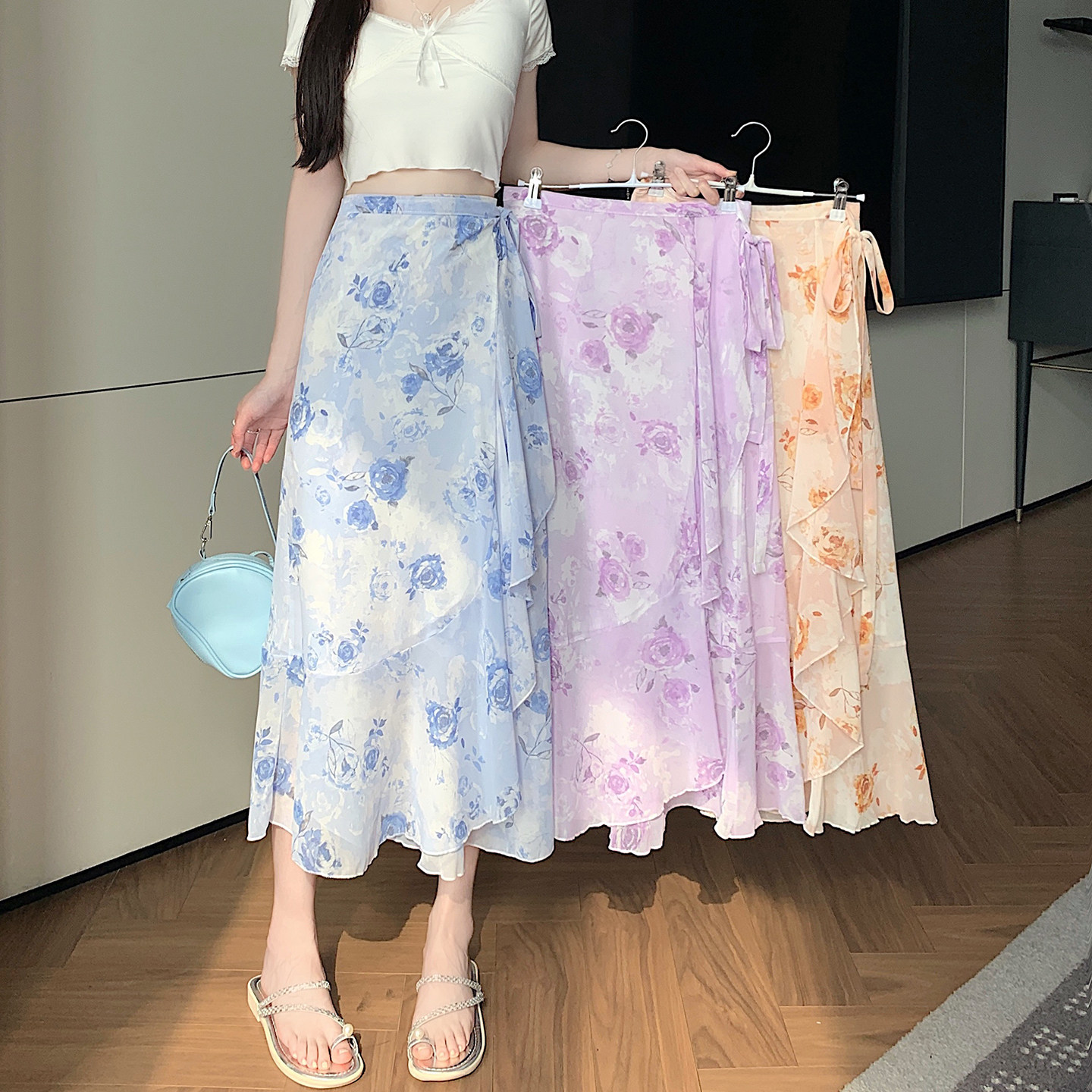 度假风一片式碎花荷叶边半身裙女2026春夏雪纺系带a字围裙包臀裙