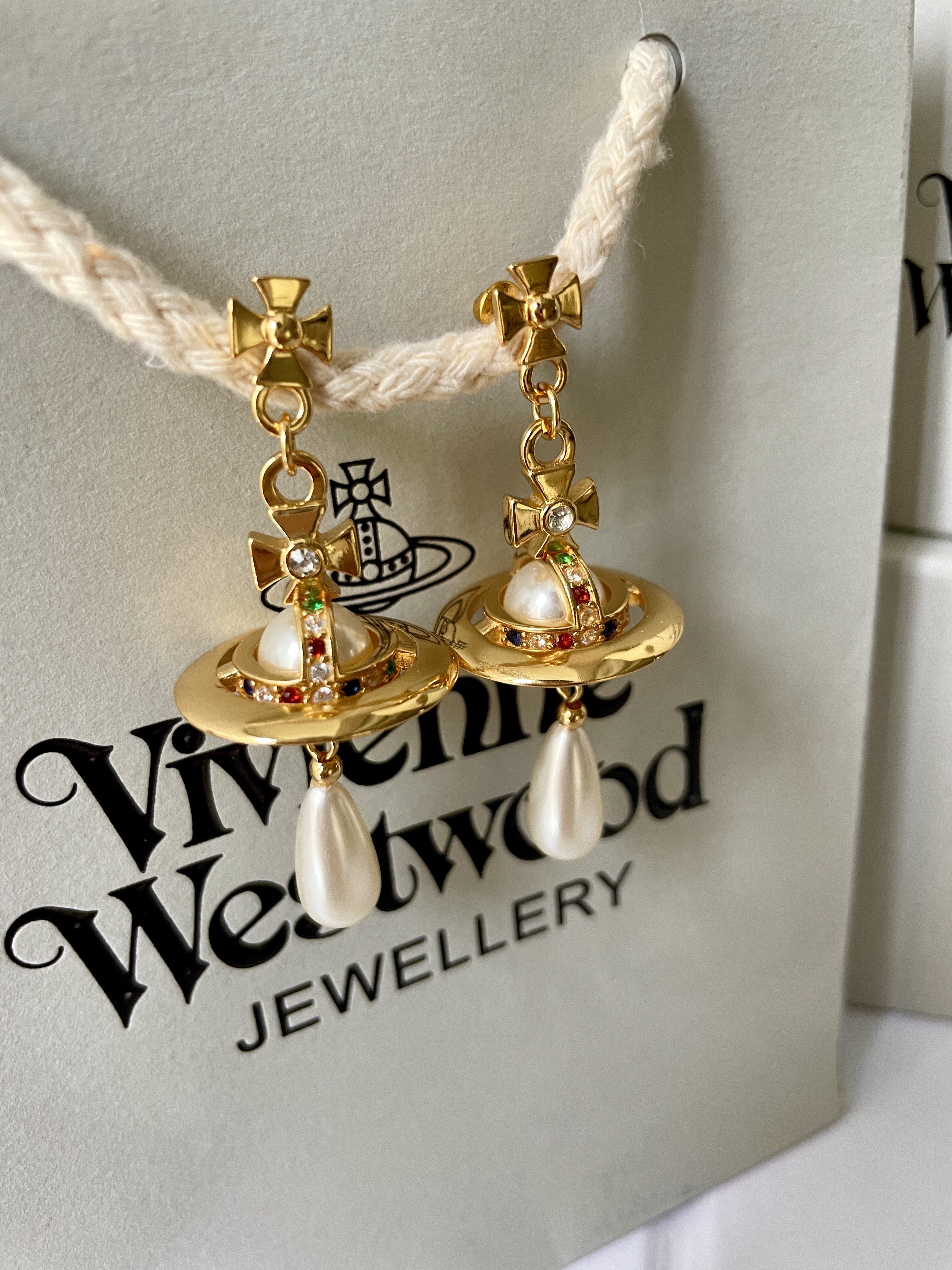 thumbnail for NANA with the same European and American style Saturn flying saucer pearl earrings female European and American niche three-dimensional planet water drop tassel earrings