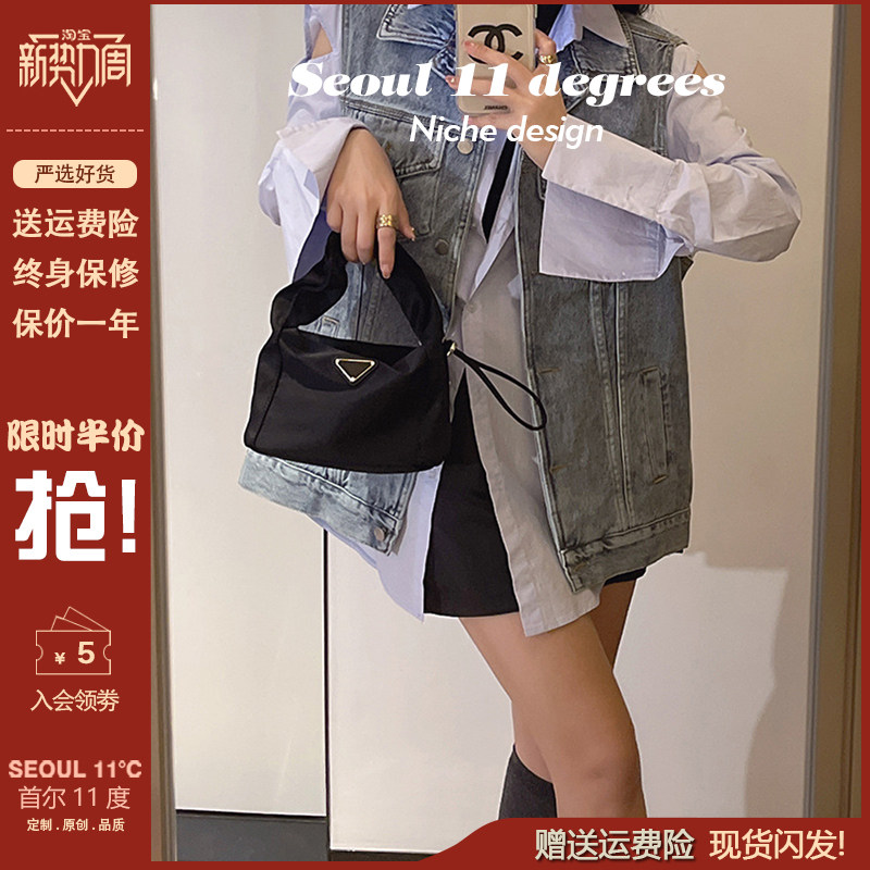 小众包包女2025新款黑色尼龙布手提包三角标复古化妆包链条斜挎包