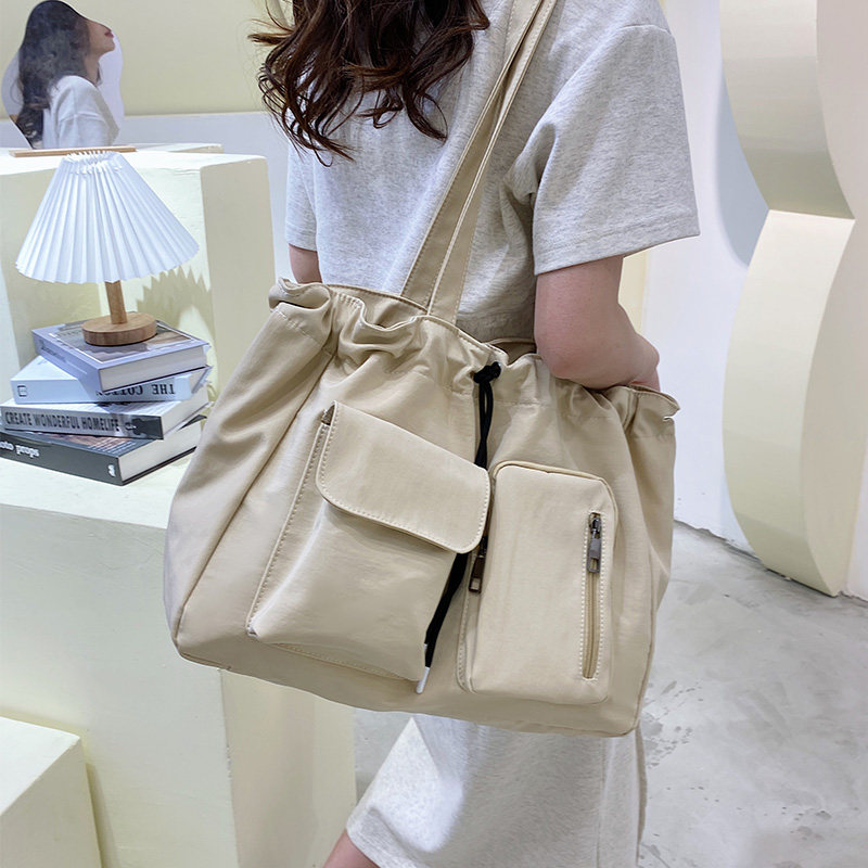 大容量托特包女2025新款大学生上课电脑通勤单肩斜挎手提帆布包包