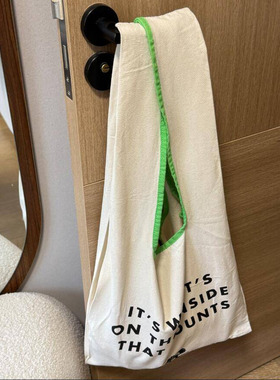 这个真都很奇怪~！出口日韩原单 米白色字母手拎单肩帆布购物袋