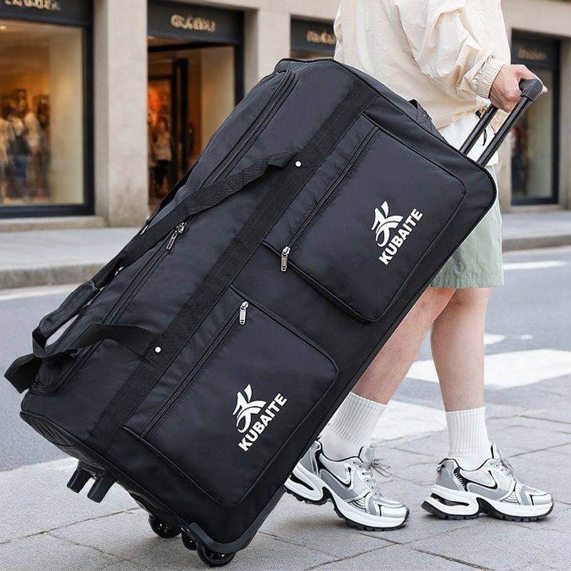 特大容量拉杆包旅行托运包被褥搬家行李包收纳打工轮子超大旅行包