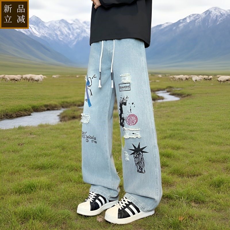 品质牛仔裤男士春秋新款破洞宽松个性街头弯刀潮牌休闲涂鸦痞帅阔