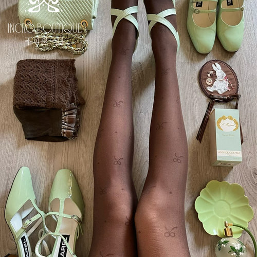 不可思一间原创蝴蝶结波点法式哑光美拉德棕咖色复古网纱连裤袜