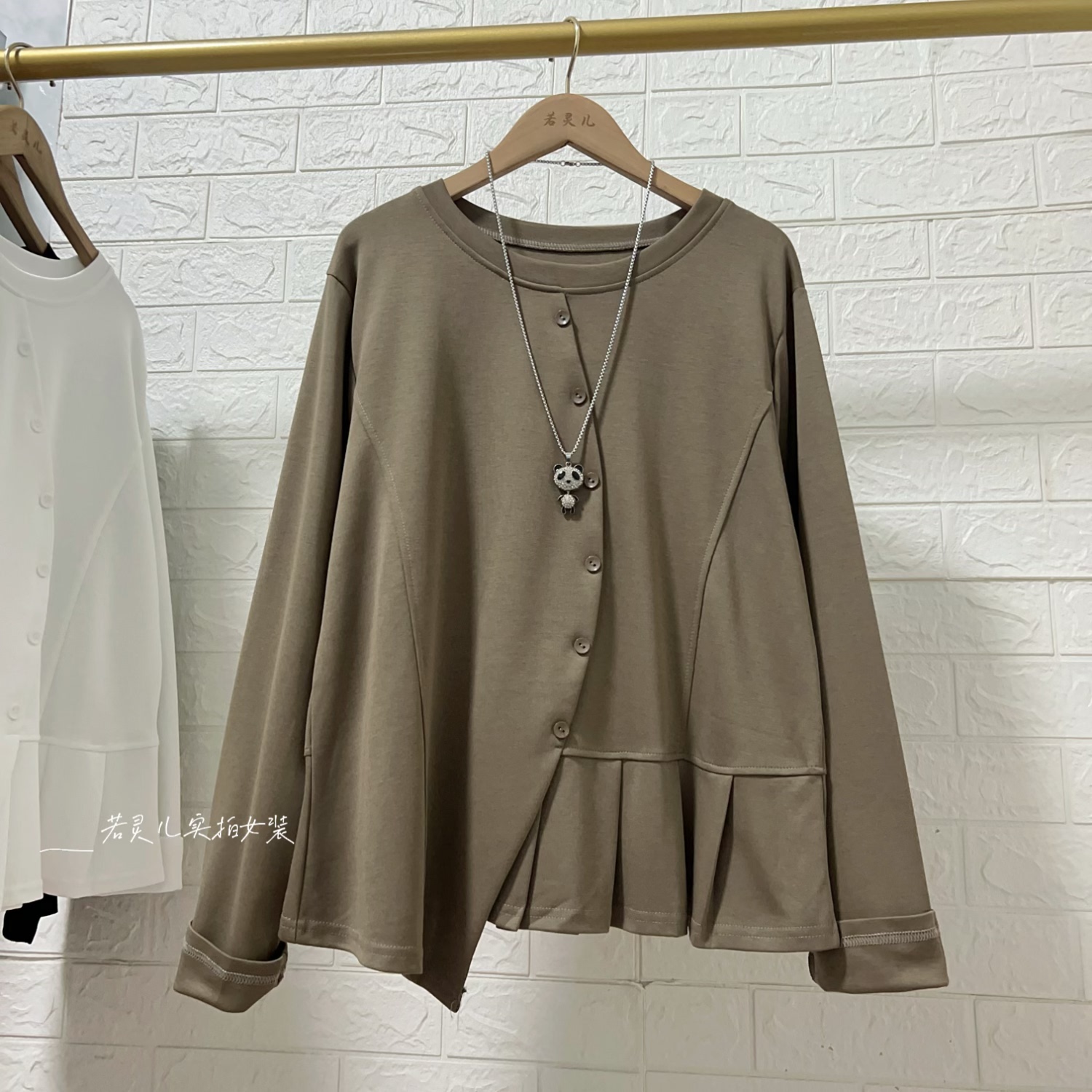 若灵儿韩版宽松休闲遮肉显瘦简约百搭排扣女装不规则下摆长袖T恤