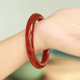 天然红色玛瑙手镯女新款 复古设计细扁圆条玉髓镯子本命年生日礼物