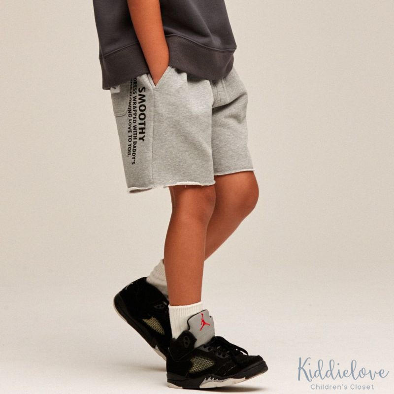 纯棉刺绣宽松下摆休闲五分裤