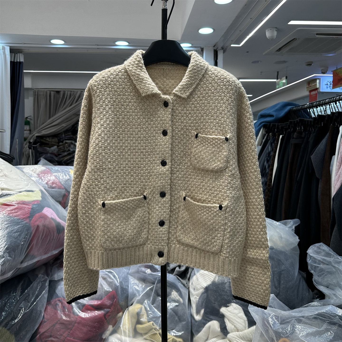 欧洲站2025冬新款翻领开衫口袋设计显瘦长袖单排扣毛衣外套上衣女