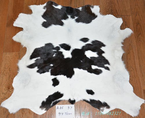 真皮毛一体整张奶牛皮地毯 奶牛羔皮A65胎牛皮台布 桌布地垫 门垫