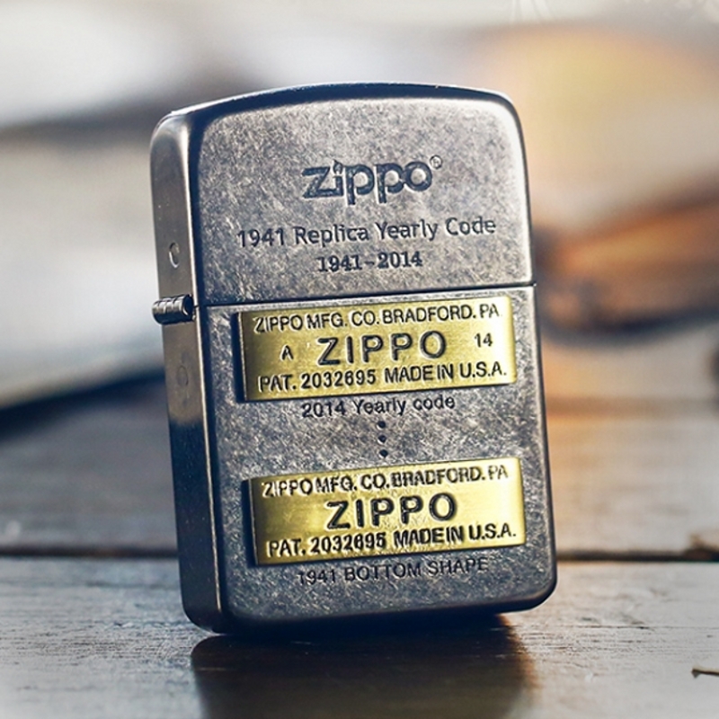 原装正品zippo打火机 黑冰1941复刻贴章底刻纪念款古银 历史演变