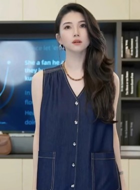 小乖逃无袖牛仔蓝连衣裙七星排扣下摆波浪花边裙M8860