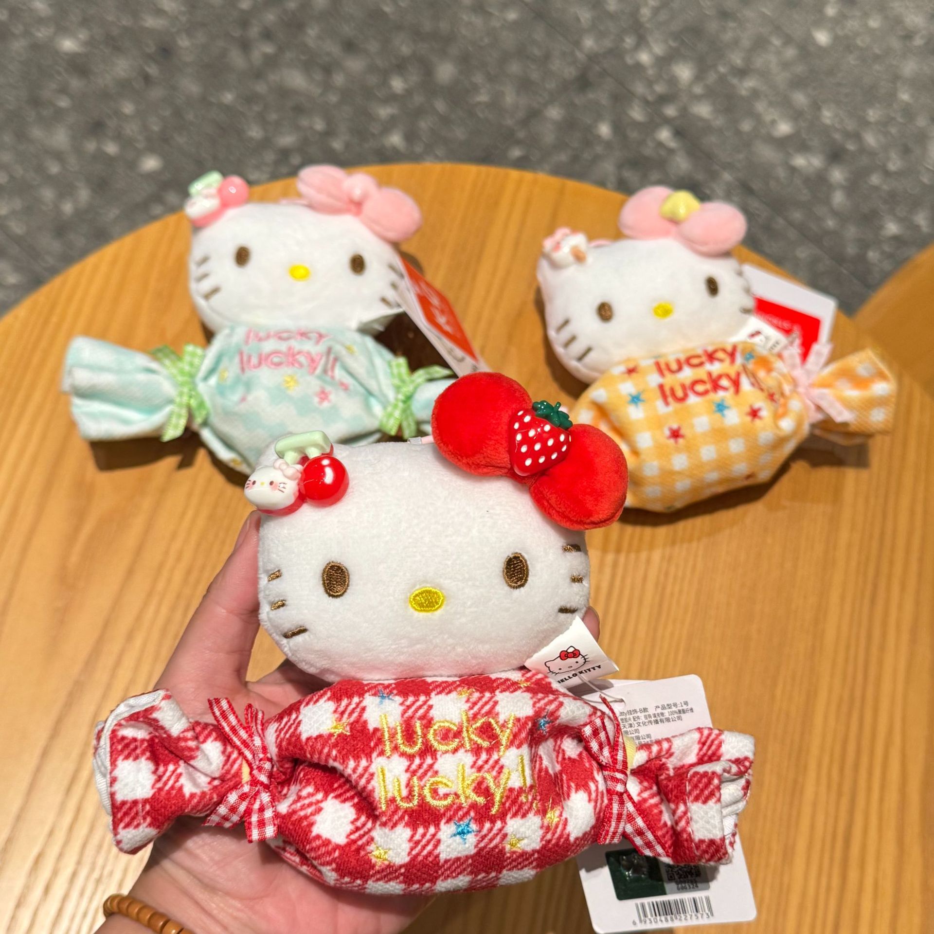 日本正版糖果kitty耳机包