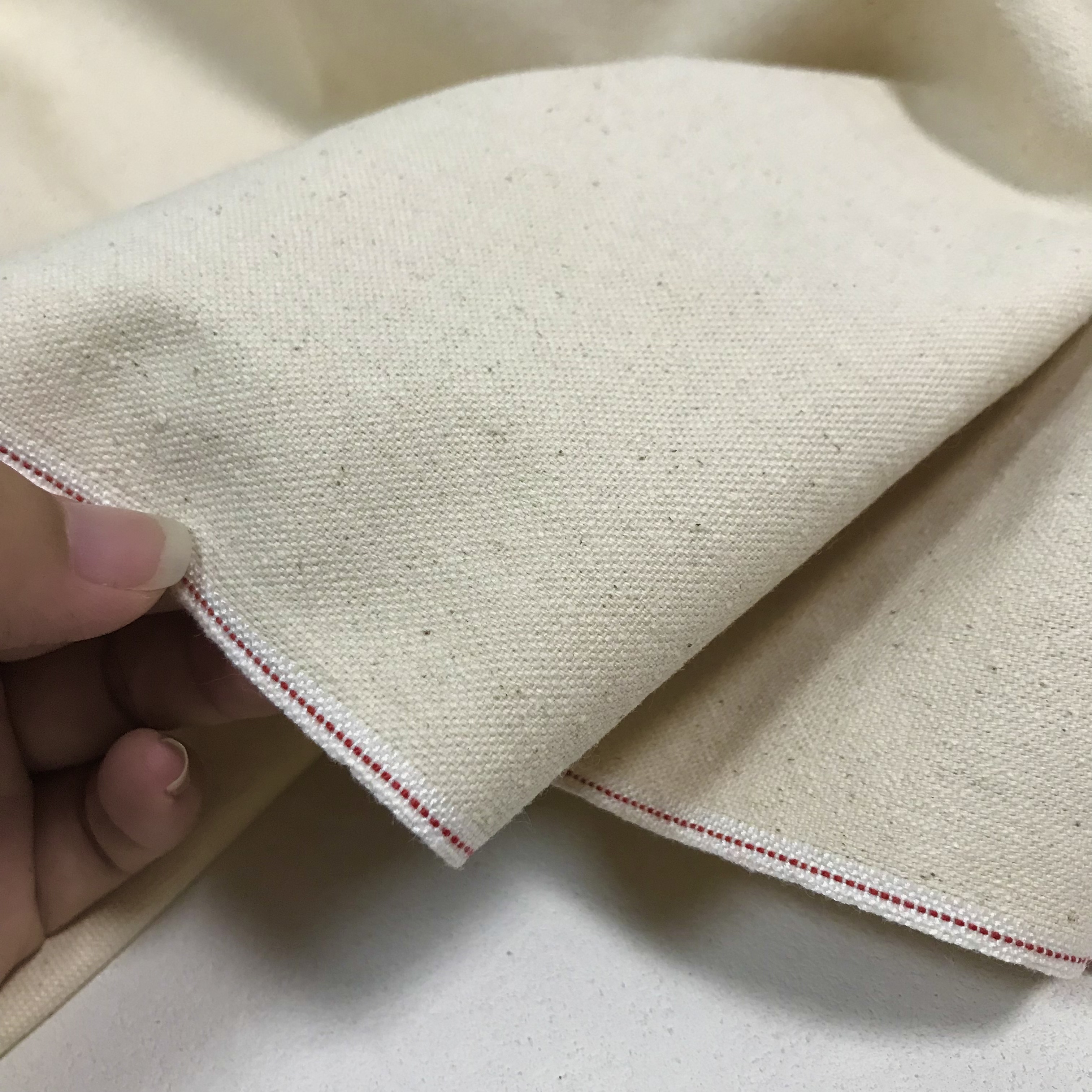 金佳中薄无弹日本冈山赤耳原浆米黄色棉籽黄点红边丹宁牛仔布料