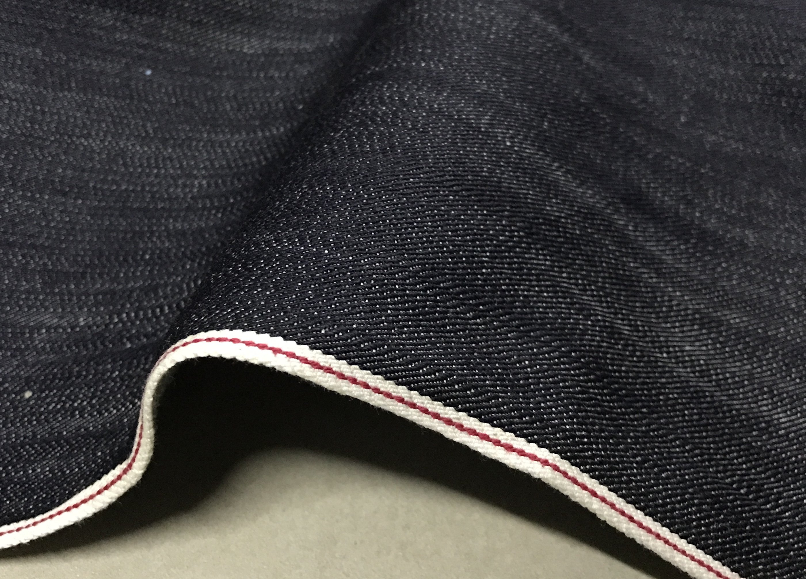 金佳厚硬无弹品质感足日本赤耳丹宁进口高端原浆黑色红边牛仔布料
