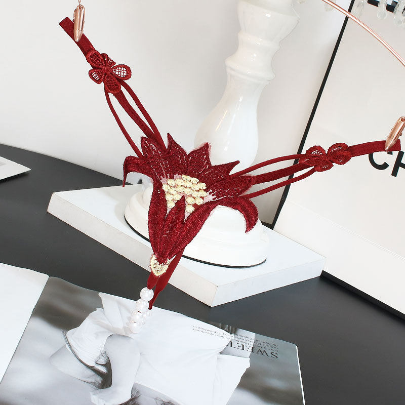 刺绣蕾丝珍珠按摩低腰镂空丁字裤