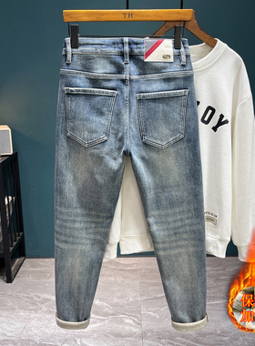 冬季薄绒牛仔裤男2025年新款简约蓝色修身弹力小脚保暖长裤