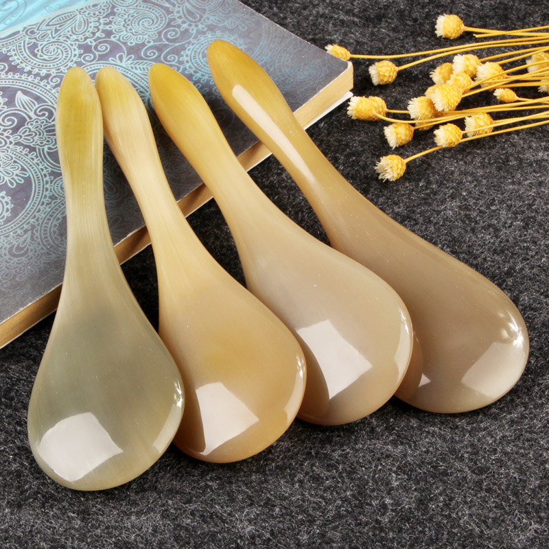 白牛角加厚面部美容刮痧球拍撥筋