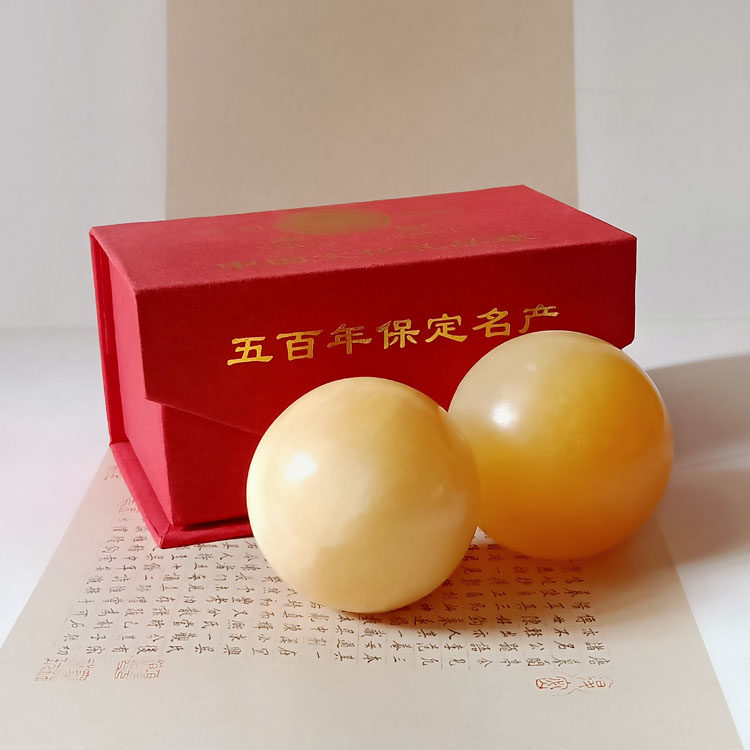 天然米黄实心运动掌中手部健身球图片
