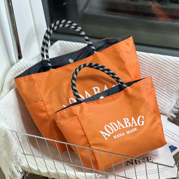 包包女日韩新款高颜值手提包女轻便防水上班族手提带饭餐包饭盒袋