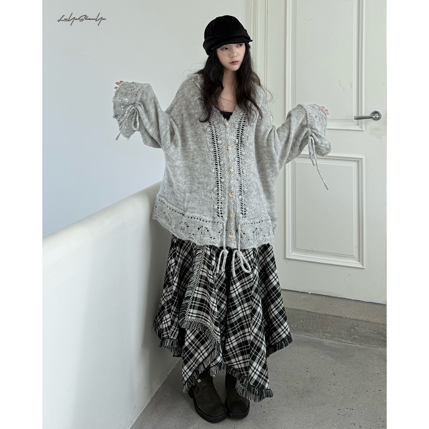 慵懒镂空抽抽绳收腰针织毛衣外套