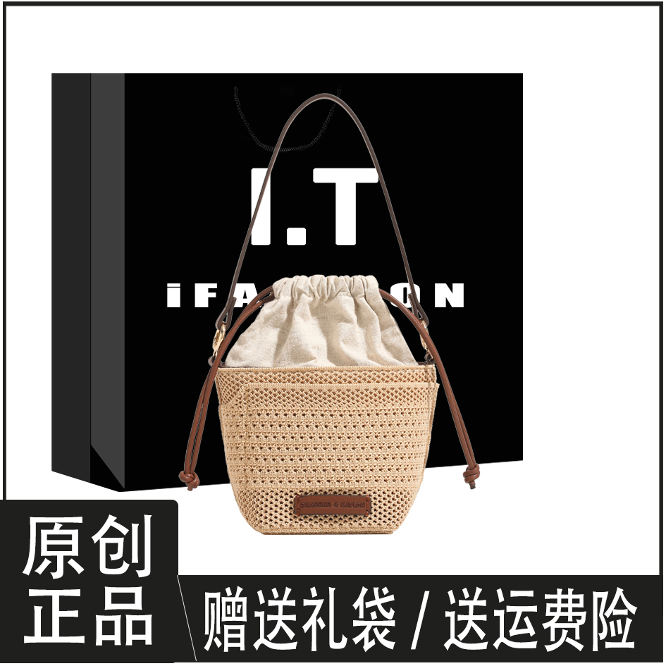 手工编织包包女式2025新款韩版潮流海边度假镂空沙滩包斜挎水桶包